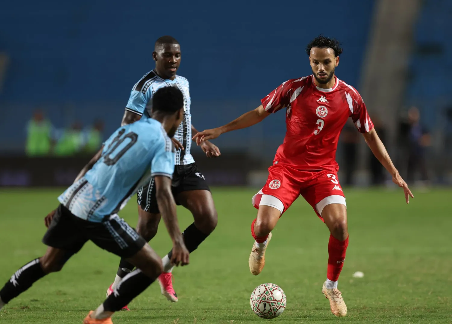 Tunisia's Montassar Talibi (R) fights for the ball with player of Botswana's Thero Setsile (L) during the CAF Africa Cup of Nations 2027 qualifying Group H match between Tunisia and Botswana in Tunis, Tunisia, 28 September 2026. (EPA) 