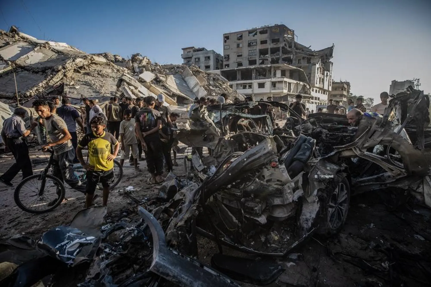 The destroyed car after it was targeted by the Israeli military in Gaza City, 27 September 2026. (EPA)