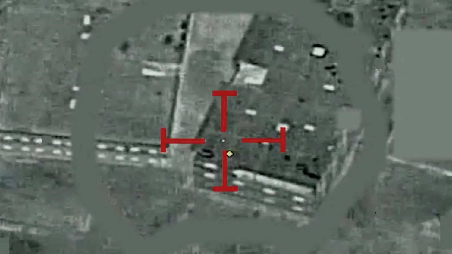 A structure appears in the crosshairs in an undated screengrab taken from a social media video released September 27, 2026, which the Media Center of the Yemeni Armed Forces said shows airstrikes against Houthi militia positions. Media Center of the Yemeni Armed Forces/via REUTERS  