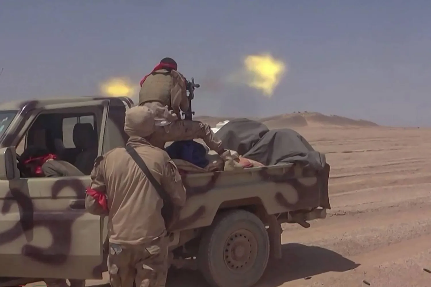 This frame grab taken from AFPTV video footage shows Yemeni government fighters engaging in clashes with Houthis in Al-Jawf province on September 15, 2026.  (Photo by AFPTV / AFP)