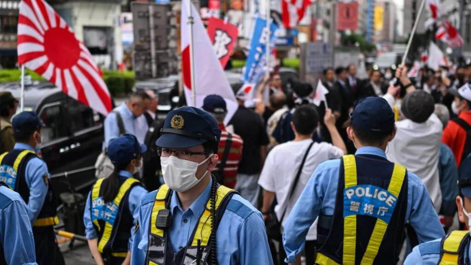 Foreign residents wishing to stay in Japan permanently will have to prove their annual income is above average. Andrew CABALLERO-REYNOLDS / AFP