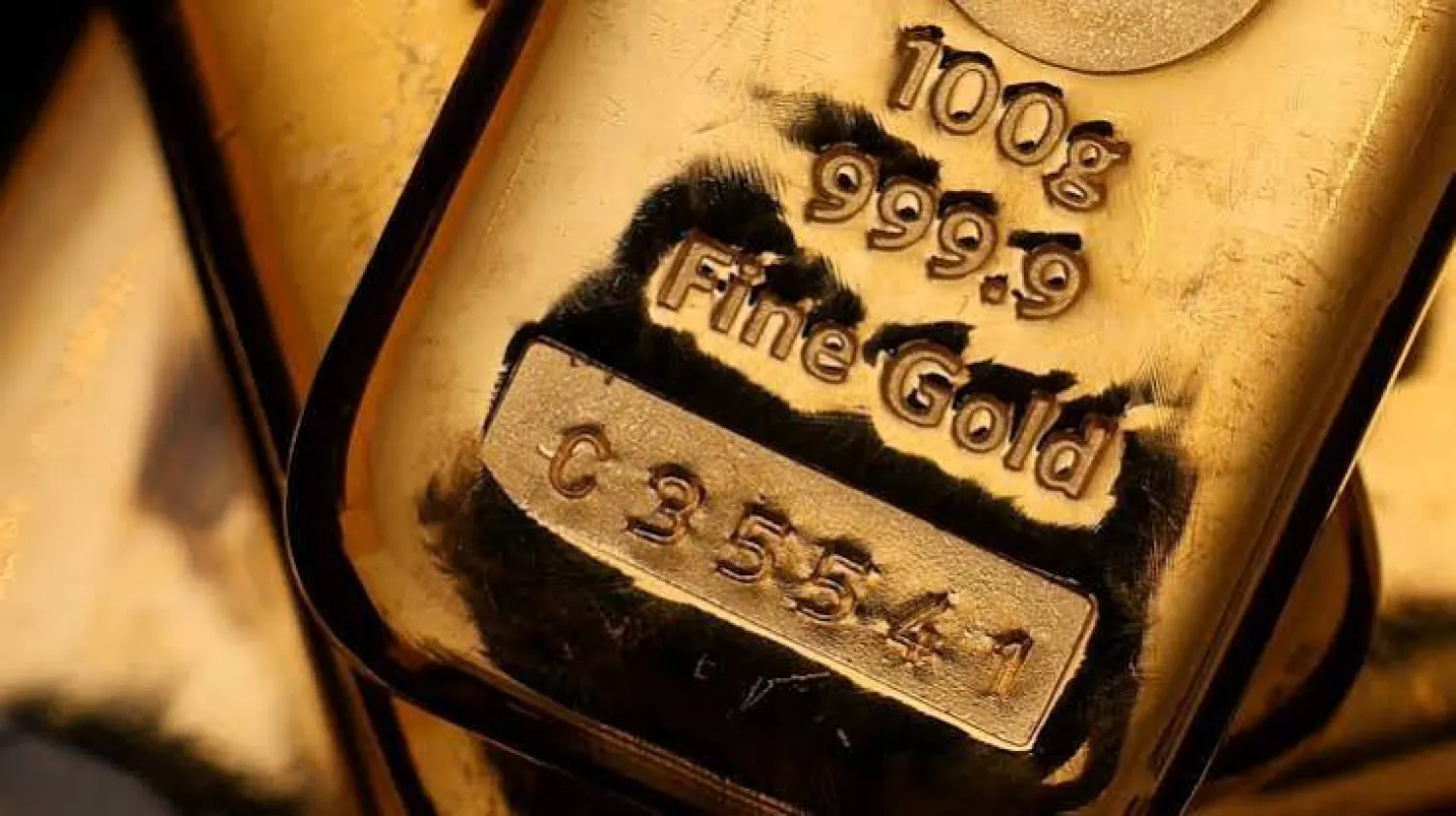 UK gold bullion bars are stacked at Baird & Co in Hatton Garden in London, Britain, October 8, 2025. REUTERS/Hiba Kola/File Photo