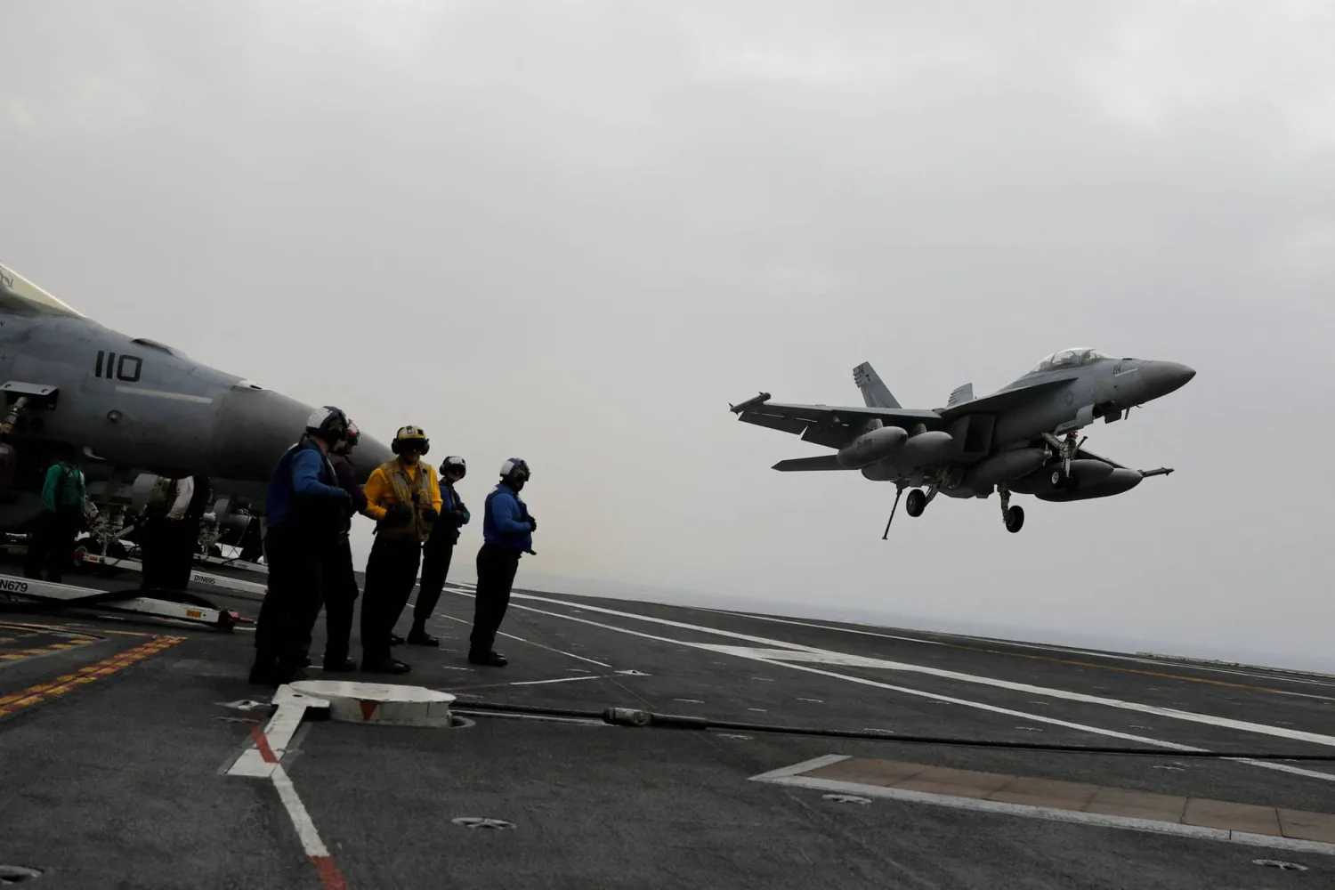 An F/A-18 fighter jet lands on the USS Harry S. Truman aircraft carrier in the eastern Mediterranean Sea, May 4, 2018. (Reuters)