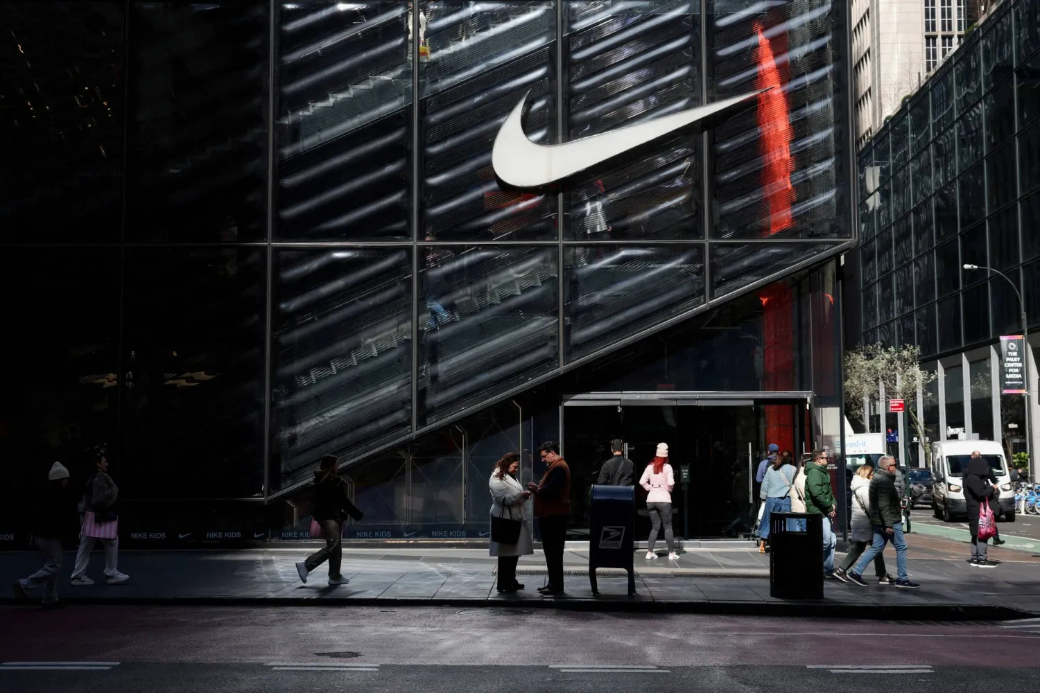 People walk past a Nike store in New York City, US, April 2, 2025. (Reuters)