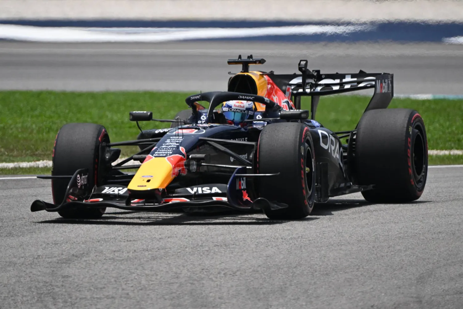 Red Bull Racing's Dutch driver Max Verstappen steers his car during the first practice session ahead of the Formula One Bahrain Grand Prix in Sepang on October 2, 2026. (Photo by JADE GAO / AFP)