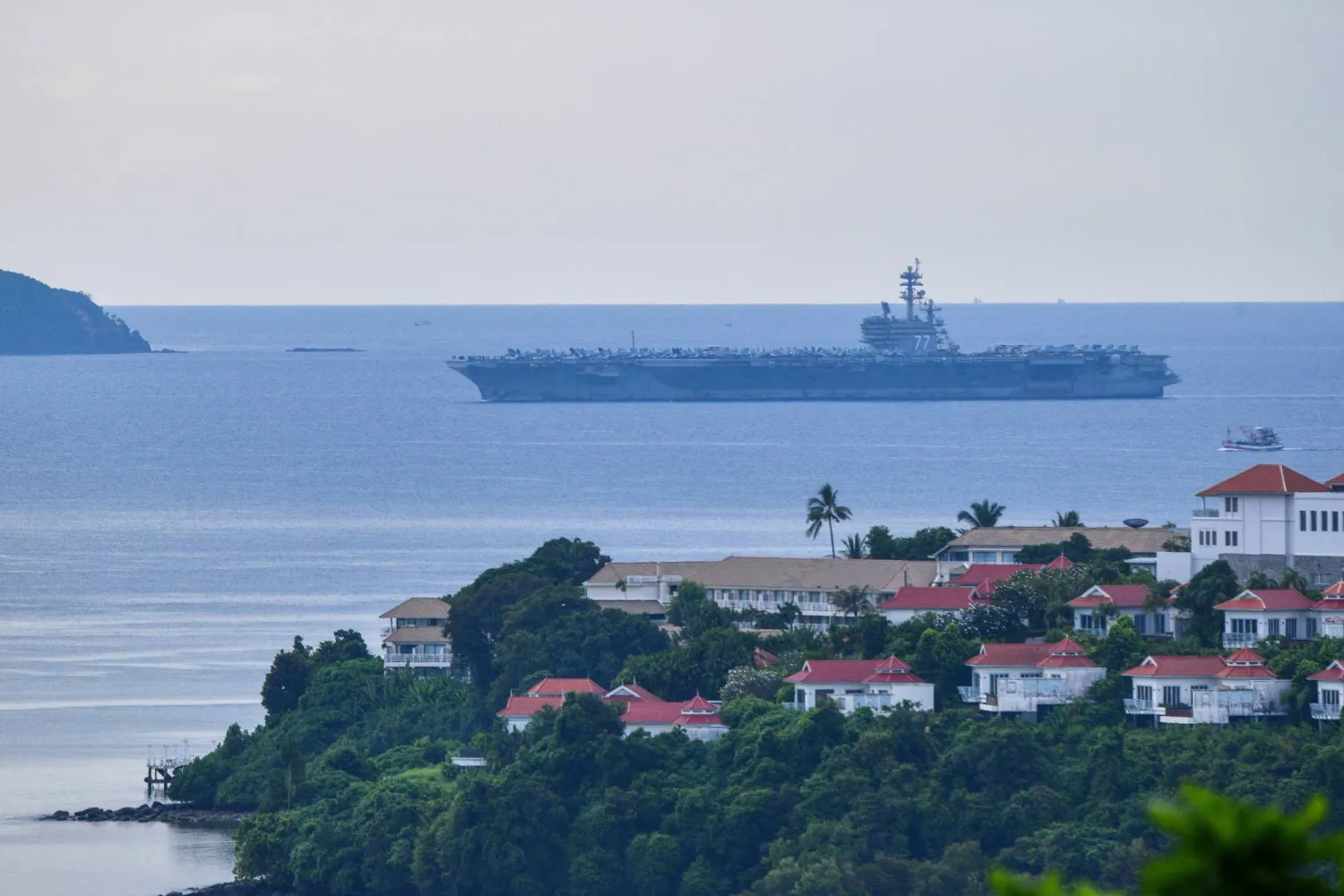 The USS George H.W. Bush arrives near Phuket Deep Sea Port before docking for a rest stop following a long deployment in the Middle East, in Phuket, Thailand, October 4, 2026. REUTERS/Sooppharoek Teepapan