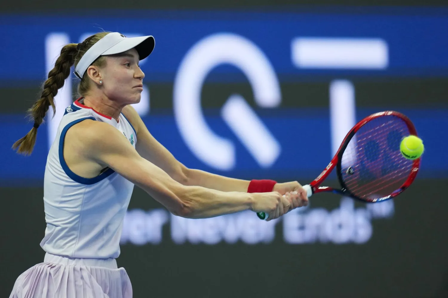 Elena Rybakina, of Kazakhstan, returns a ball to Alina Charaeva, of Armenia, during the second round of the women's singles match at the China Open tennis tournament in Beijing, Saturday, Oct. 3, 2026. (AP Photo/Ng Han Guan)