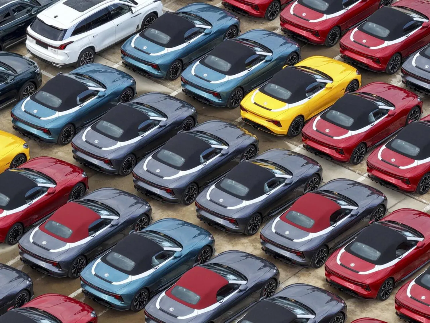 Brussels toughened its stance towards Beijing to defend businesses from what it believes is unfair competition in critical sectors including cars. CN-STR/AFP/File
