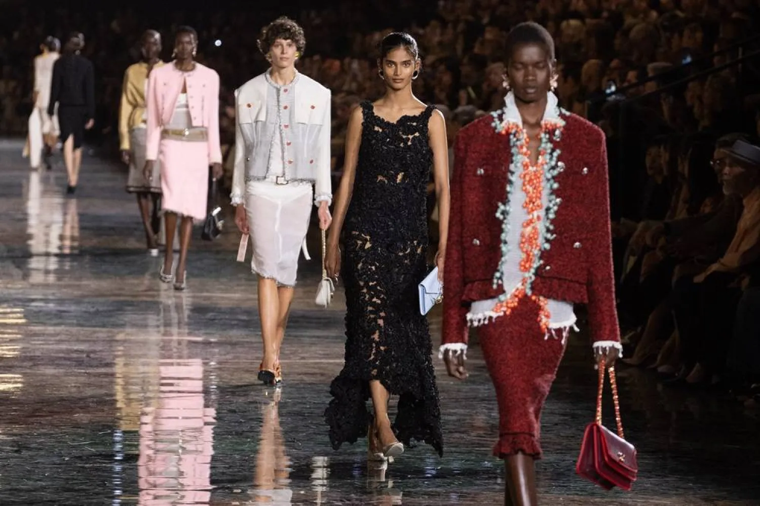 Models present creations from the Spring/Summer 2027 collection of Chanel during Paris Fashion Week, in Paris, France, 05 October 2026. (EPA) 