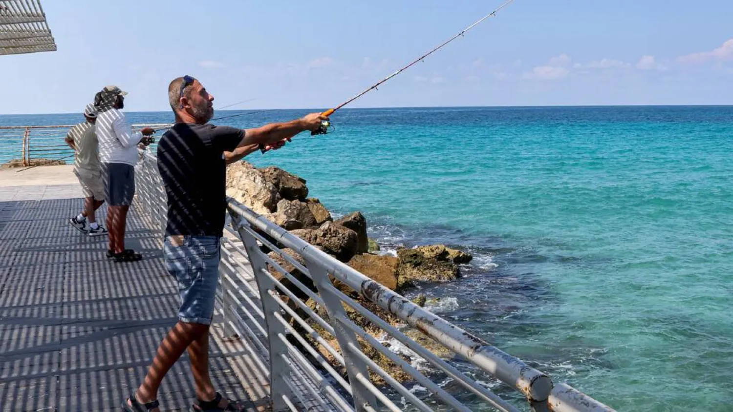 Nahariya resident Maxim Zarbaylov says he is considering not backing Netanyahu for the first time. JACK GUEZ / AFP
