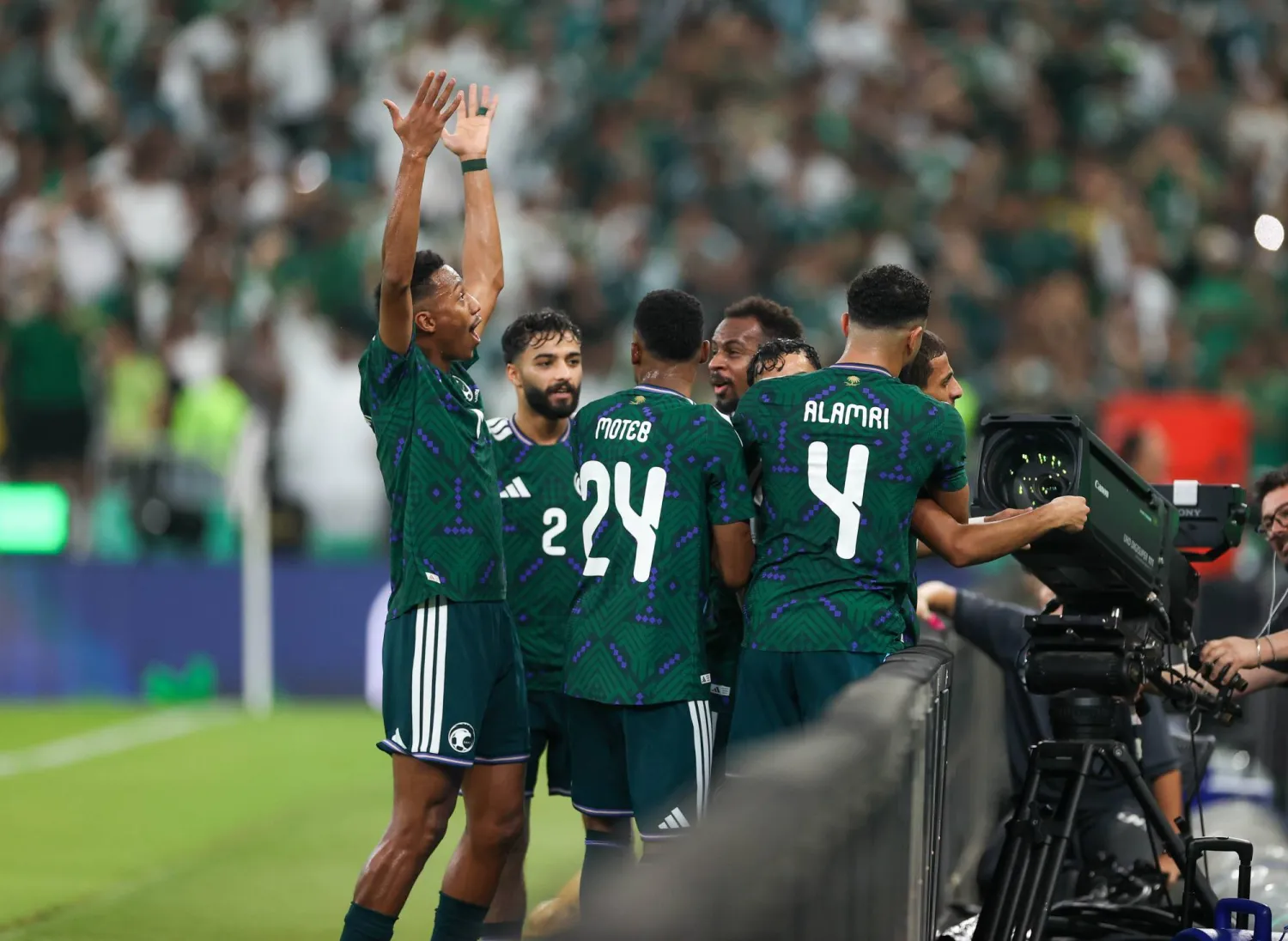 همام الهمامي يحتفل بهدف التقدم أمام منتخب الإمارات (تصوير: عدنان مهدلي) 