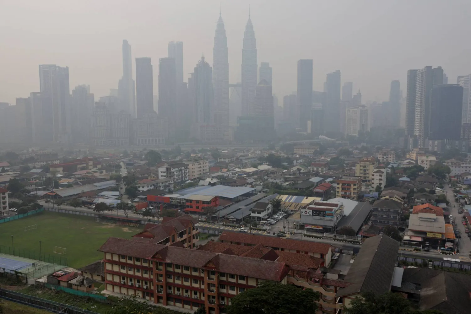 Kuala Lumpur's skyline shrouded in haze from regional wildfires, in Kuala Lumpur, Malaysia, October 9, 2026. REUTERS/Hasnoor Hussain
