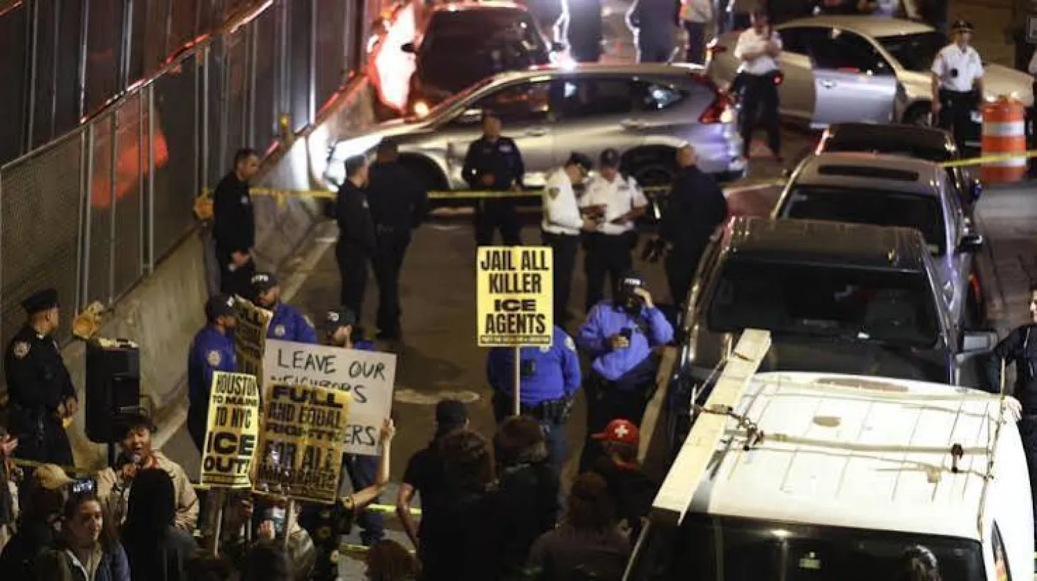 Protesters near the scene where a man was shot by an Immigration and Customs Enforcement (ICE) officer during an operation in the Bronx borough of New York. CHARLY TRIBALLEAU / AFP
