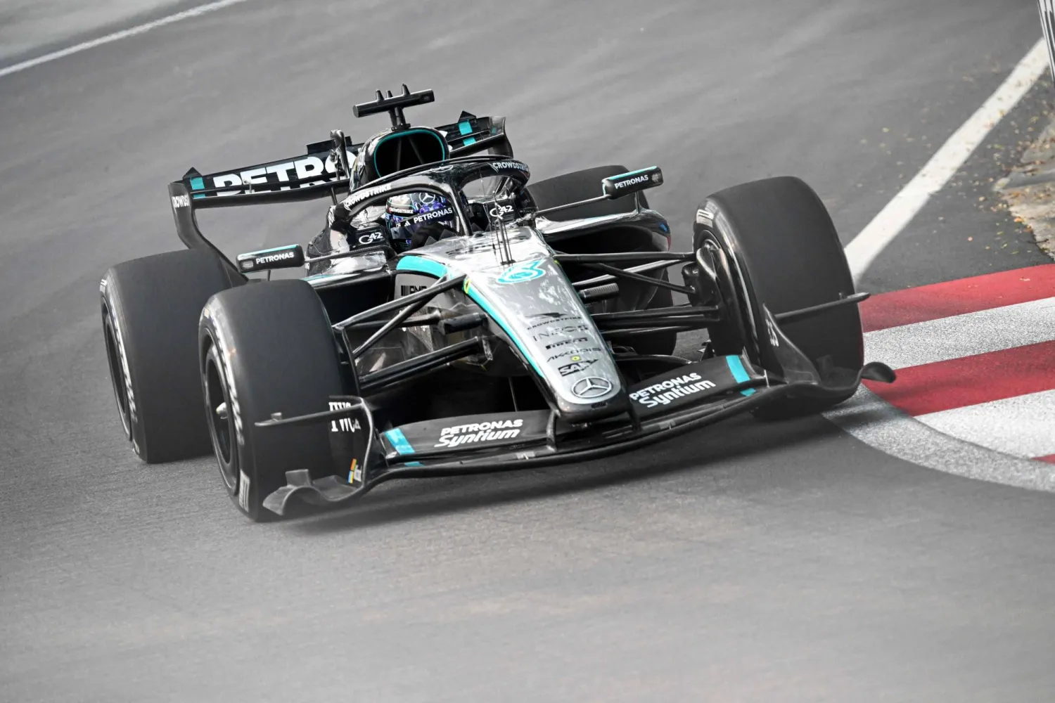 Mercedes' British driver George Russell drives during a practice session ahead of the Formula One Singapore Grand Prix at the Marina Bay Street Circuit in Singapore on October 9, 2026. (Photo by Lillian SUWANRUMPHA / AFP)
