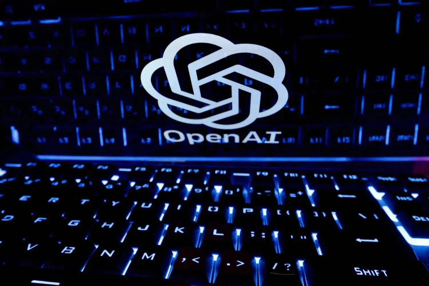 A keyboard is placed in front of a displayed OpenAI logo in this illustration taken February 21, 2023. REUTERS/Dado Ruvic/Illustration//File Photo