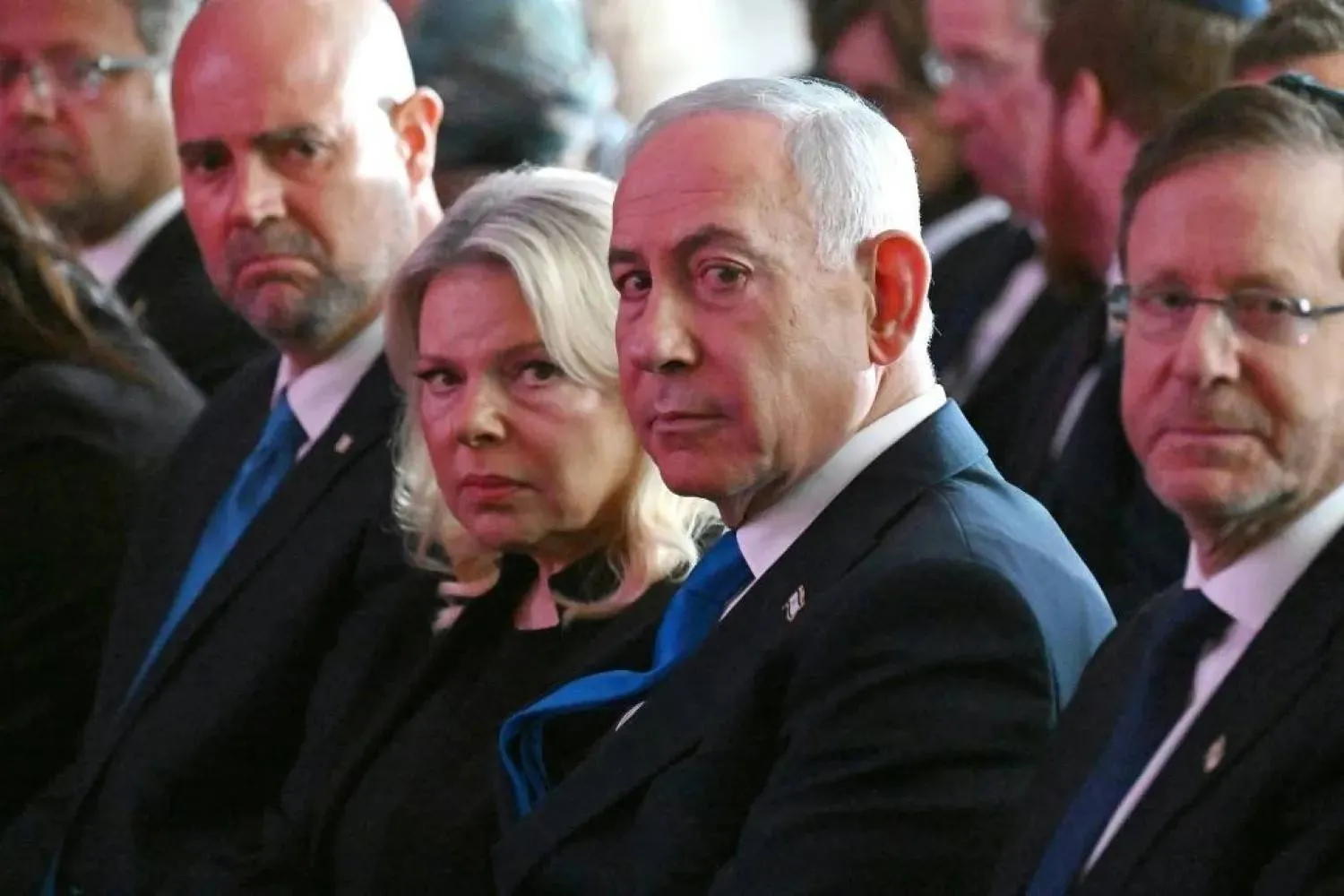 Benjamin Netanyahu with his wife and Israeli President Isaac Herzog (AFP)