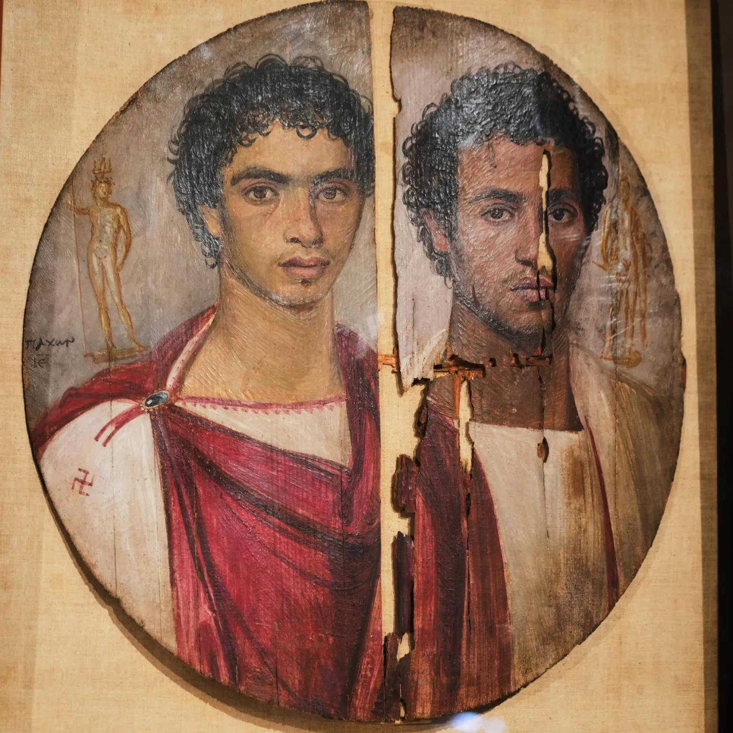 Fayoum portraits, "Tondo of the Two Brothers", Egyptian icons from the Greco-Roman period the 1st century BC, are displayed at the Egyptian Museum in Cairo, Egypt, Sunday, Oct. 11, 2026, after being restored. (AP Photo/Amr Nabil)