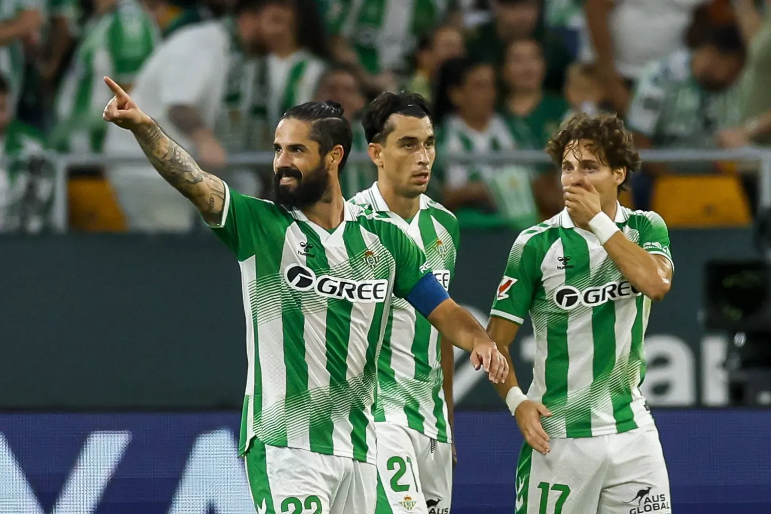 Real Betis' Isco (L) celebrates after he scored his second goal during the Spanish LaLiga soccer match between Real Betis and Osasuna in Seville, Spain, 11 October 2026. (EPA)
