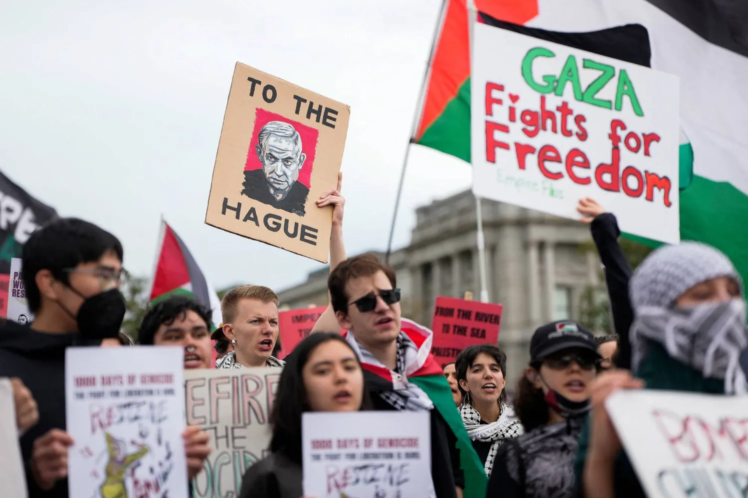  A demonstrator holds a sign with a picture depicting Israeli Prime Minister Benjamin Netanyahu during a pro-Palestinian rally, marking the third anniversary of the war in Gaza, at the US Capitol in Washington, DC, US, October 10, 2026. (Reuters)