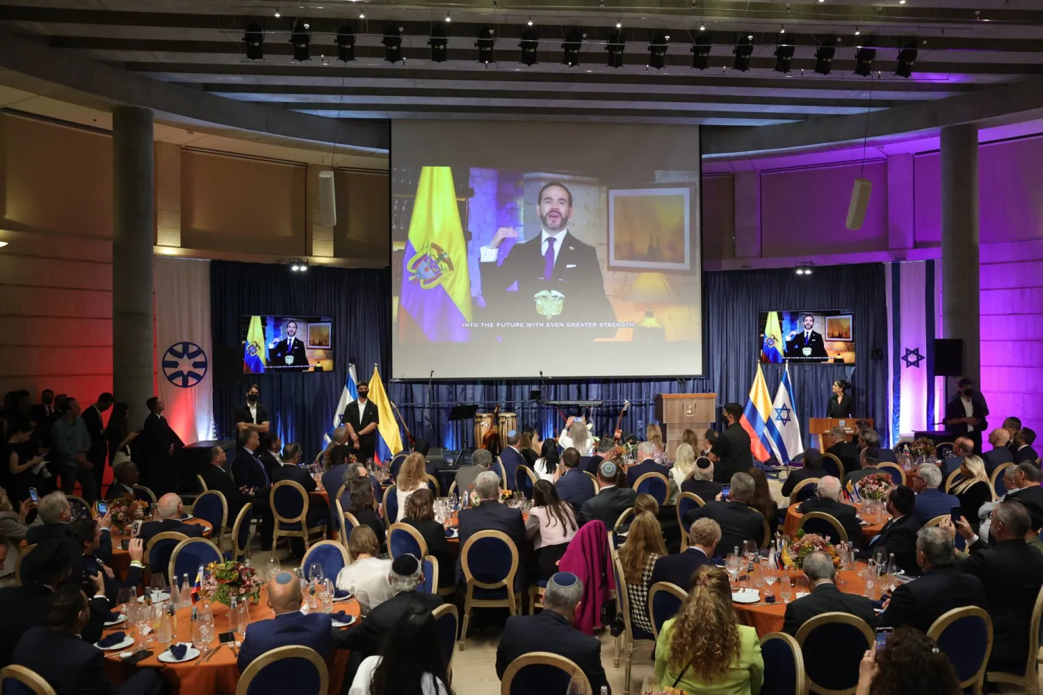Diplomats watch regards from Colombian President Abelardo de la Espriella (on screen) during a ceremony marking the opening of Colombia's new embassy in Jerusalem, at the Ministry of Foreign Affairs in Jerusalem, Israel, 14 October 2026. (EPA)