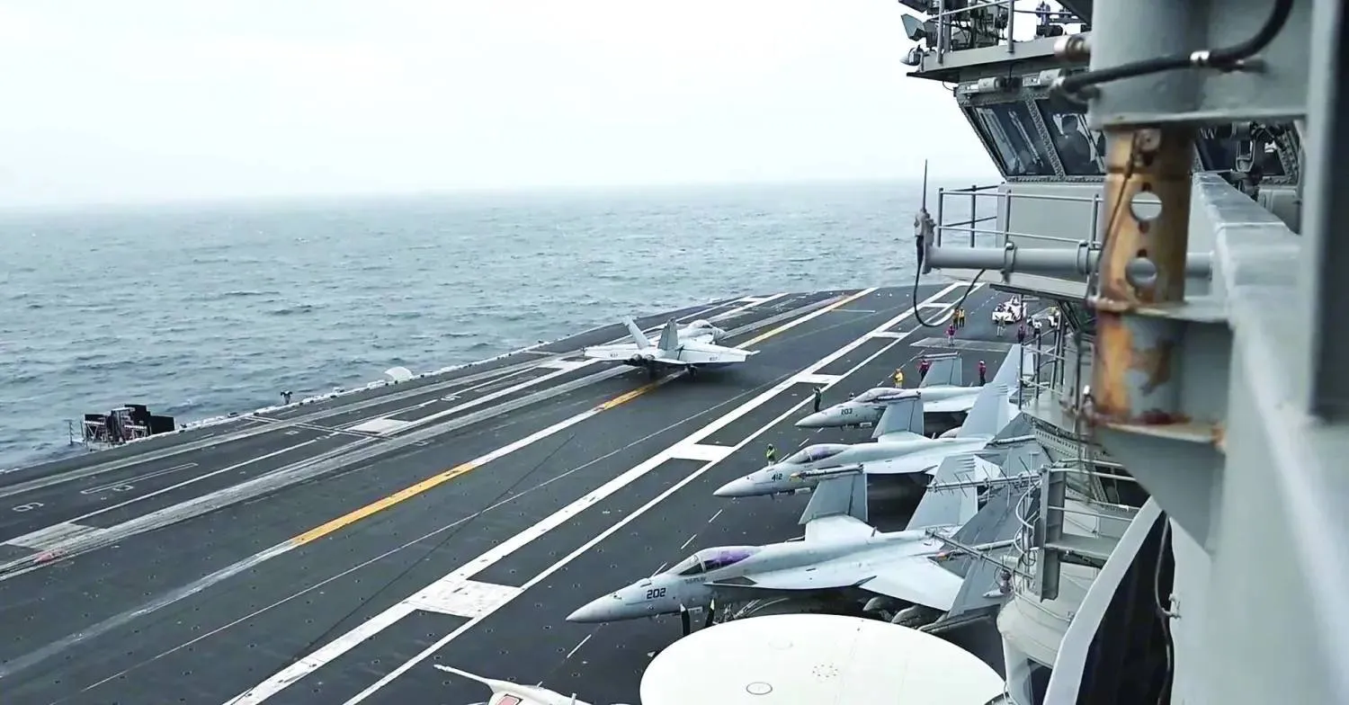The aircraft carrier USS George Washington sails in Middle Eastern regional waters. (CENTCOM) 