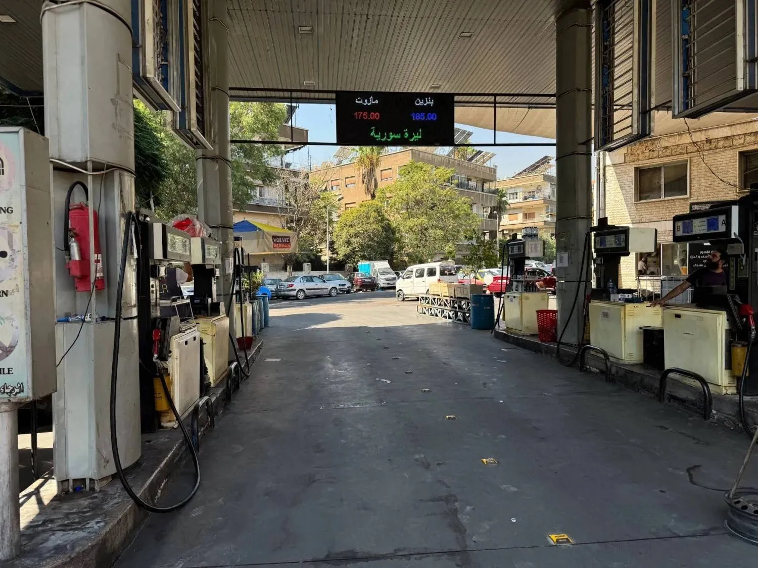 A gas station in Damascus displays fuel prices following the latest increase, which sparked protests in several Syrian cities (Reuters). 