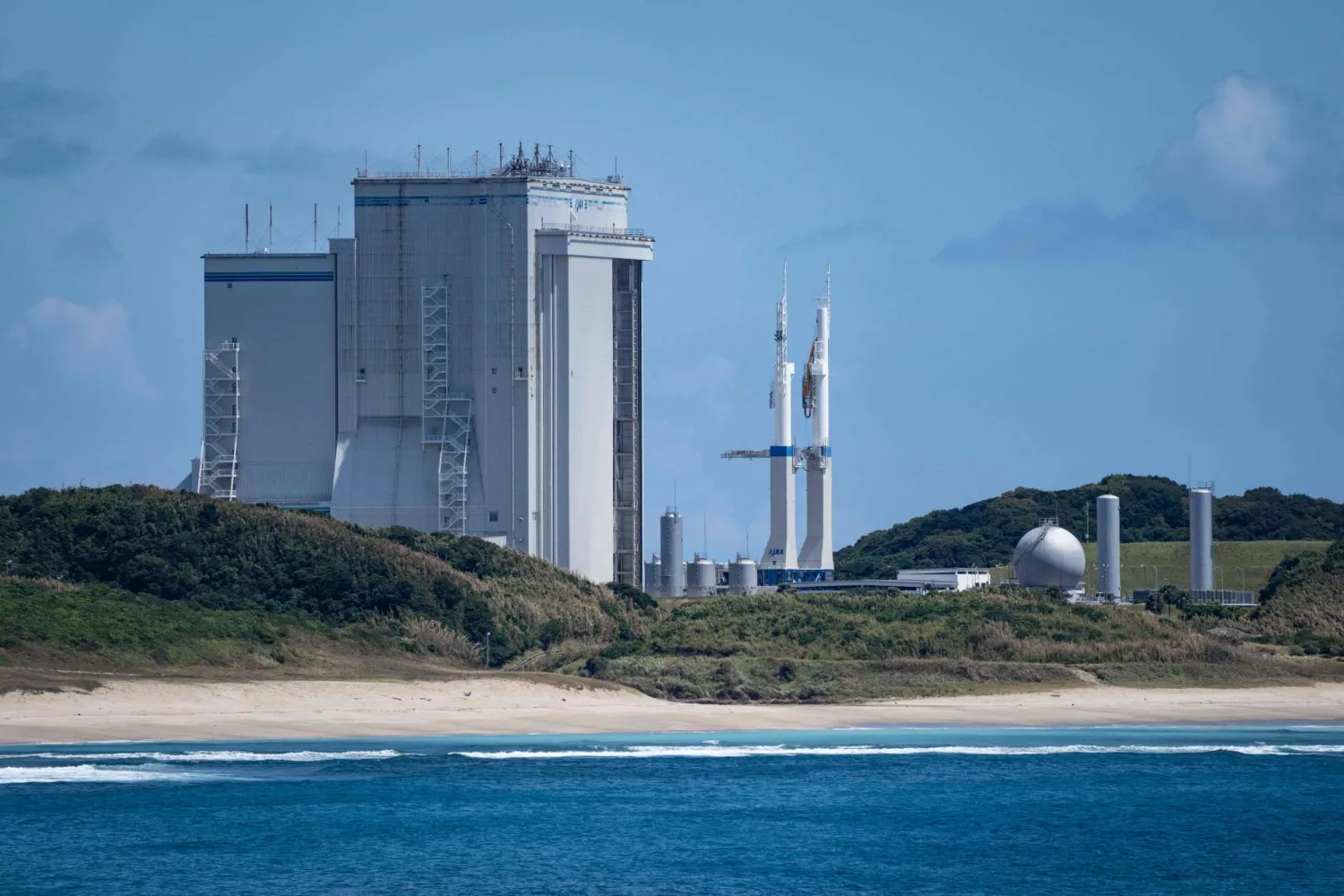 (FILES) A vehicle assembly building is seen at the Tanegashima Space Center in Minamitane, Kagoshima prefecture on August 13, 2026. (Photo by Yuichi YAMAZAKI / AFP) 