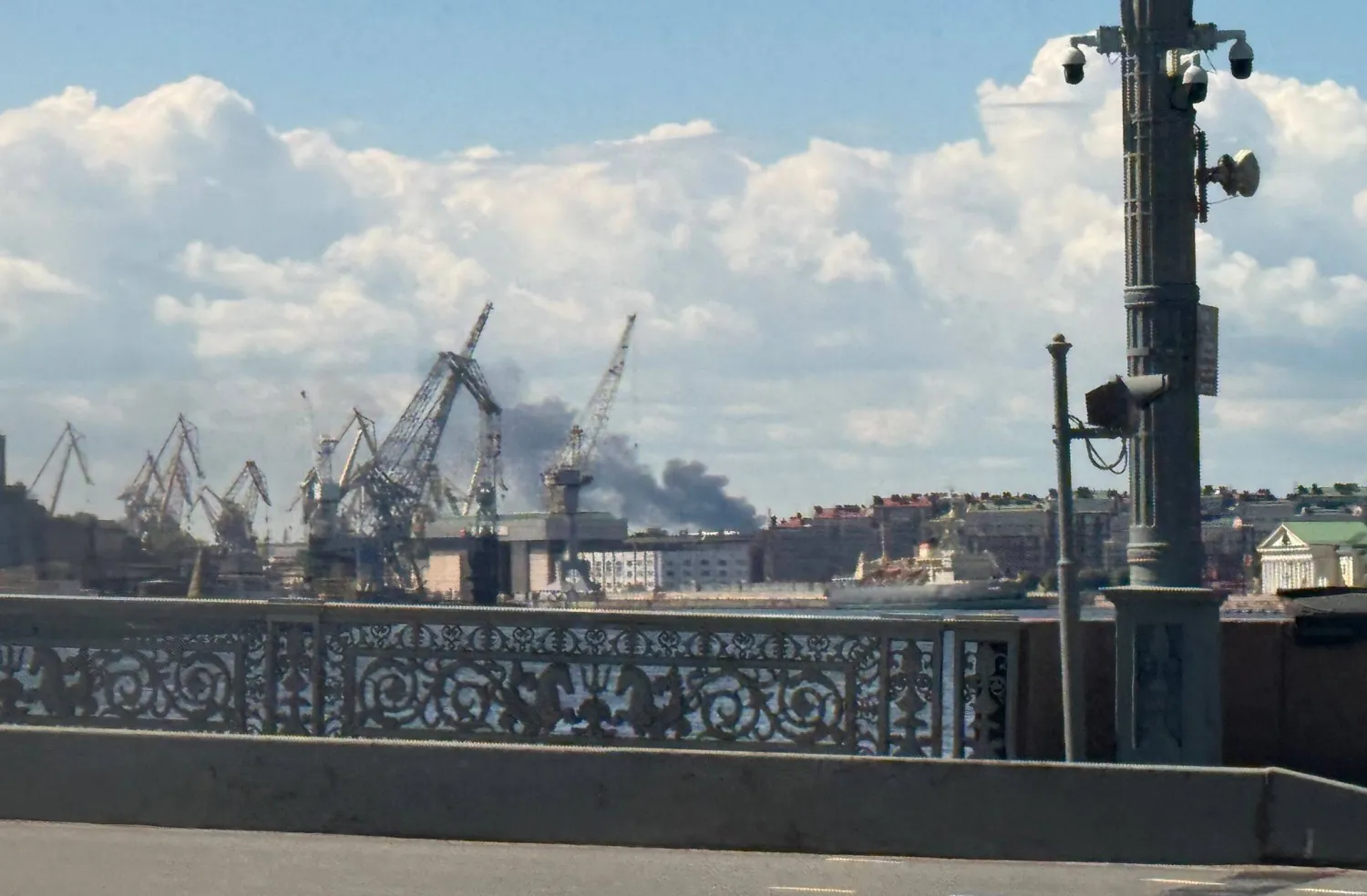 FILED - 03 June 2026, Russia, St. Petersburg: FILE PHOTO - Smoke rises in the port of St. Petersburg. Photo: Ulf Mauder/dpa