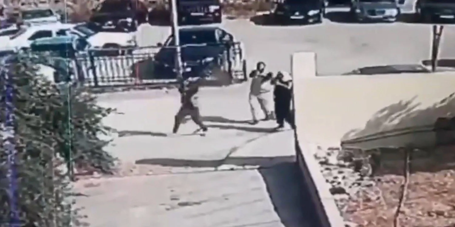 صورة مأخوذة من شريط فيديو للمسلحين خلال هجومهم على الكنيسة في قرية حمود الأردنية