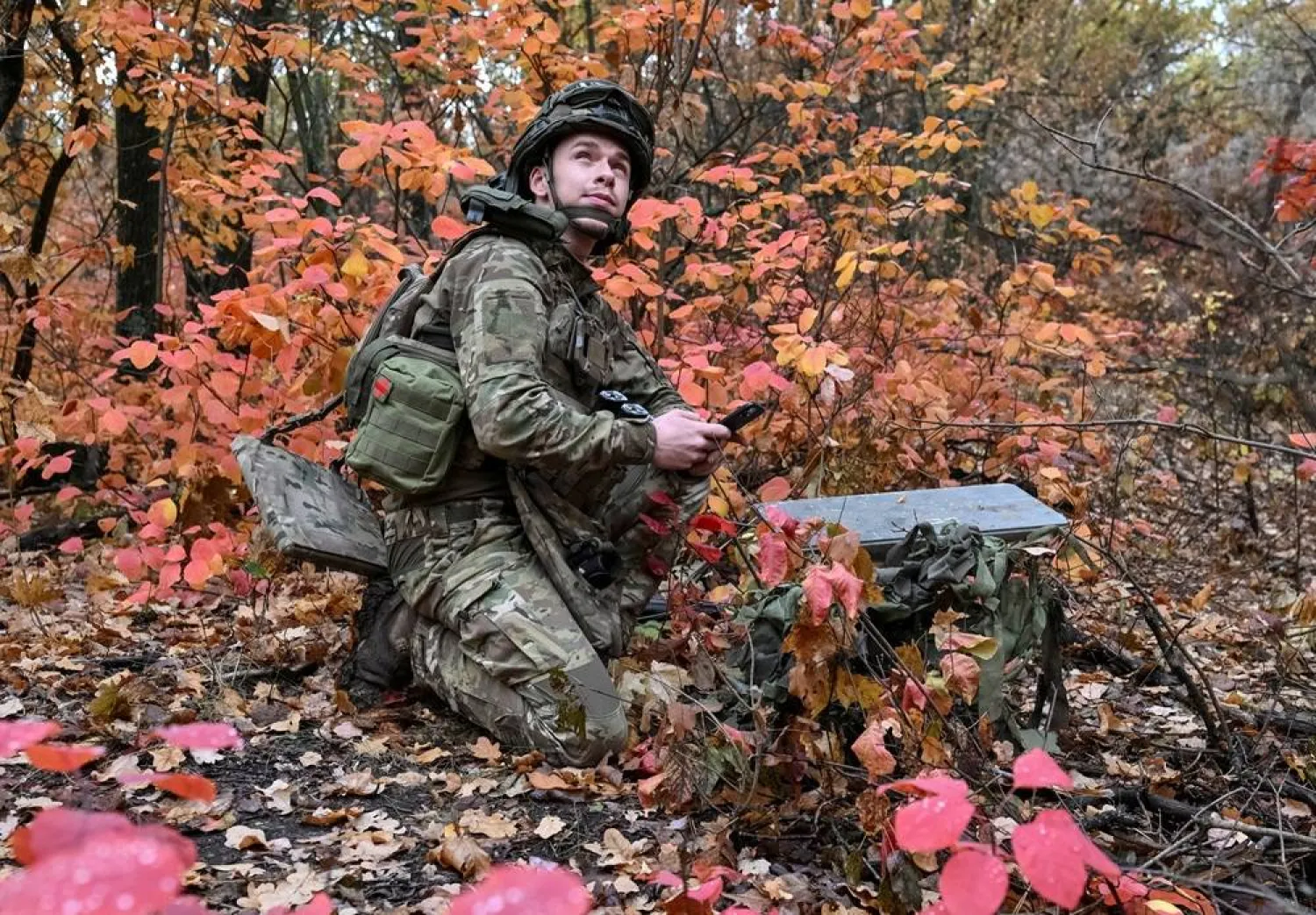 An artilleryman of the Special Rifle Police Battalion of Zaporizhzhia region sets up Starlink satellite internet system, at a position, amid Russia's attack on Ukraine, near the frontline in Donetsk region, Ukraine, October 16, 2026. (Reuters)