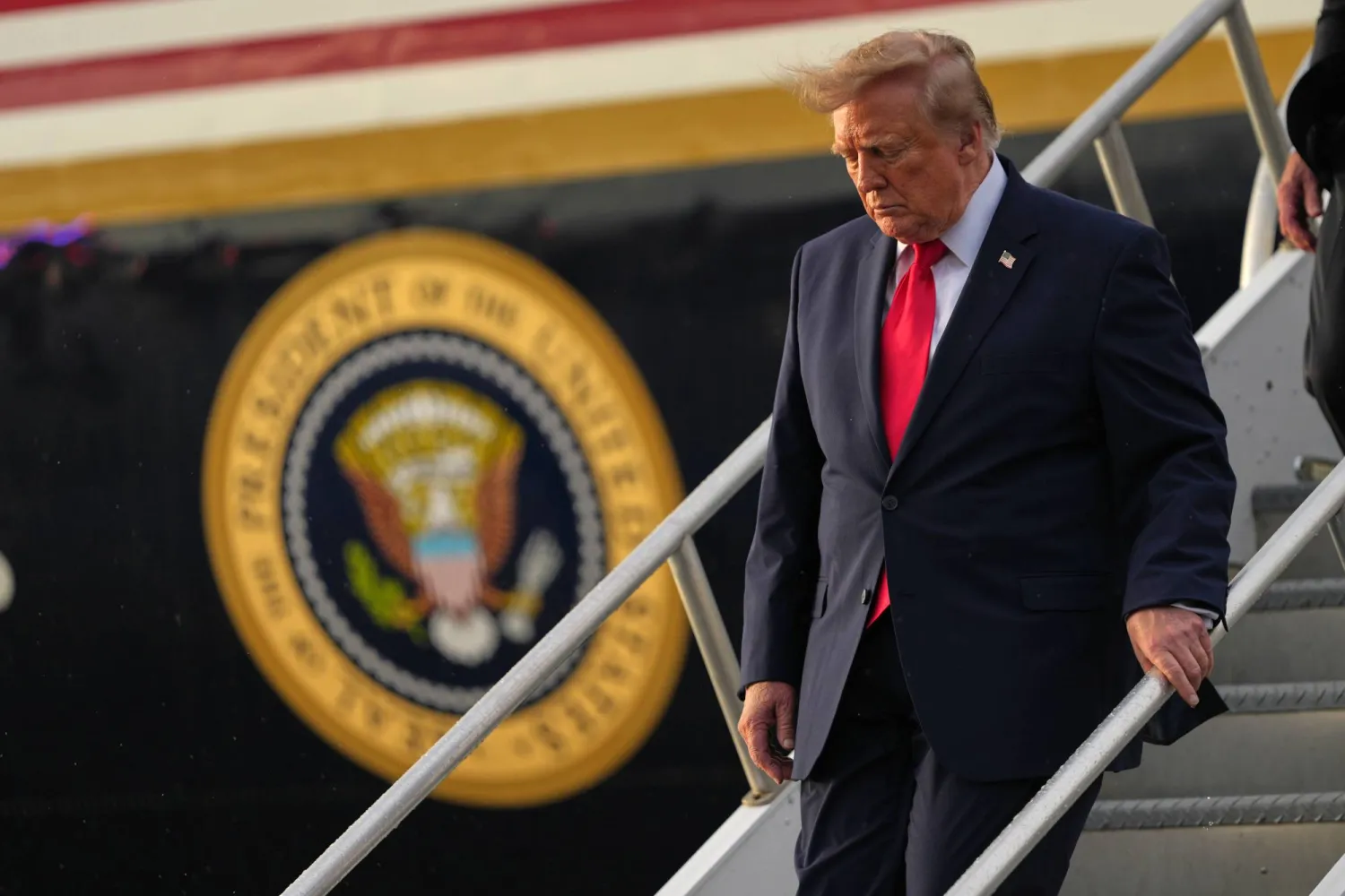 President Donald Trump arrives on Air Force One, Friday, Oct. 23, 2026, at President Donald J. Trump International Airport in West Palm Beach, Fla. (AP Photo/Mark Schiefelbein)
