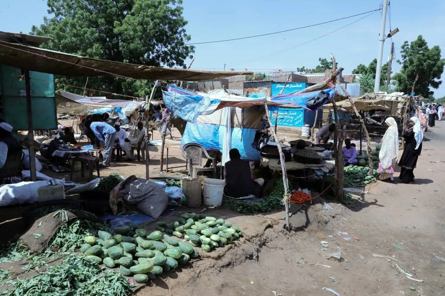  People walk through a vegetable market in El Obeid, as drought and heat linked to El Nino threaten harvests, livestock, and water supplies in Sudan's war-affected Kordofan region, El Obeid, North Kordofan, Sudan, September 13, 2026. (Reuters)