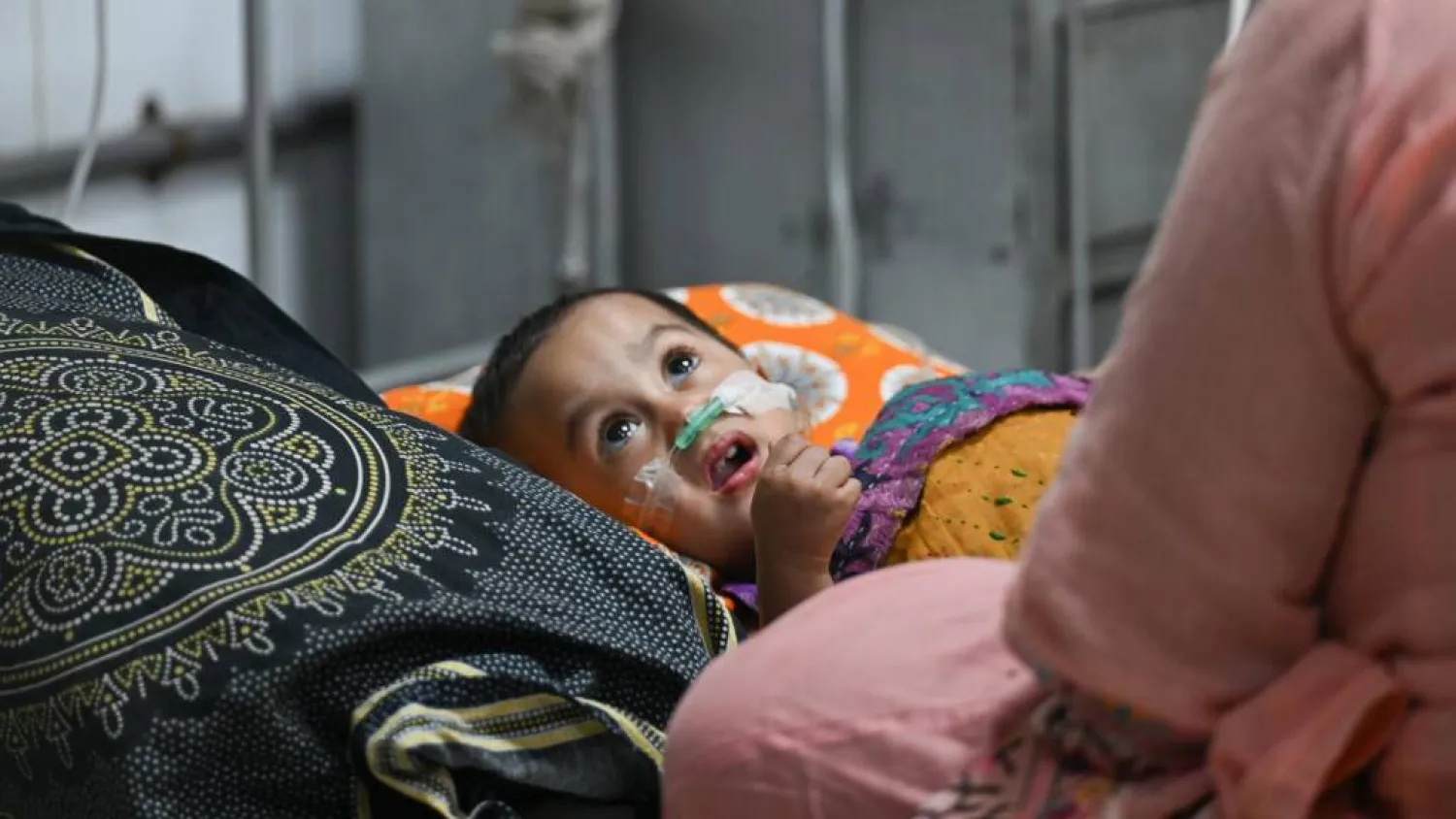 A child receives treatment for measles at the Bangladesh Shishu Hospital & Institute in Dhaka on September 3. Salahuddin Ahmed / AFP
