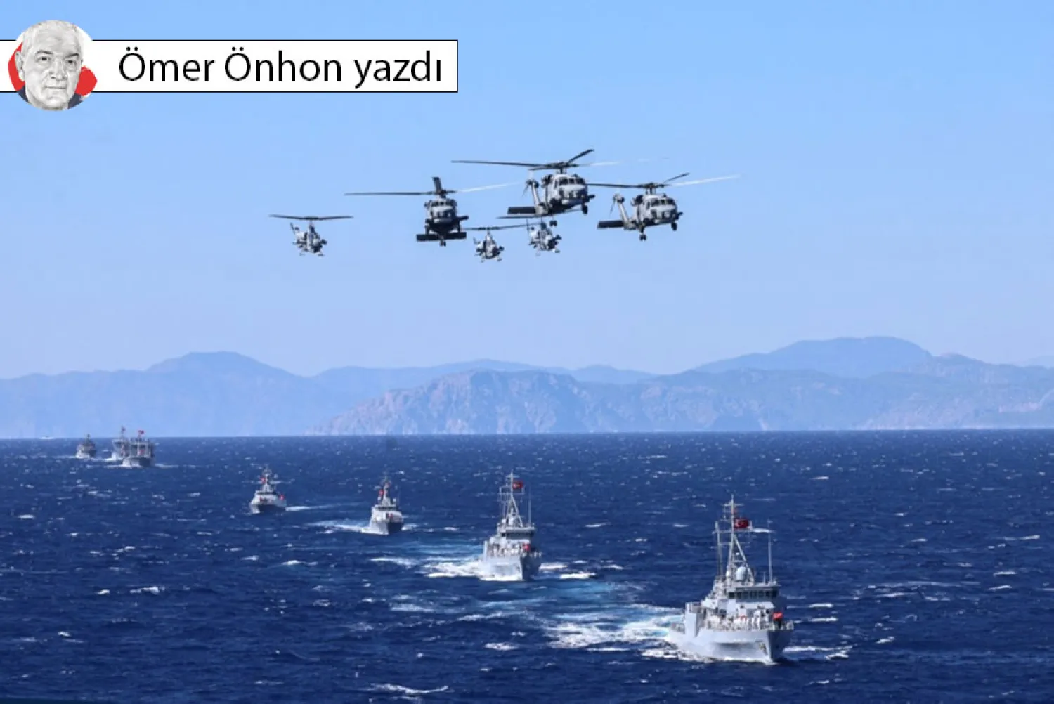 Doğu Akdeniz'de, Muğla ilinin Aksaz açıklarında düzenlenen “Deniz Kurdu-1/2026” tatbikatları sırasında bir Türk Deniz Kuvvetleri S-70B Seahawk helikopteri ve bir T-129 ATAK saldırı helikopteri gösteri yapıyor. (AFP)