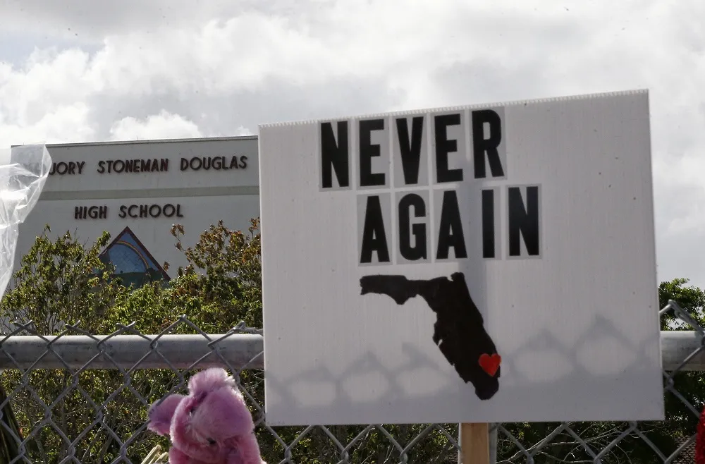 Teenager Killed by Police after Shooting 2 Students at Maryland High School