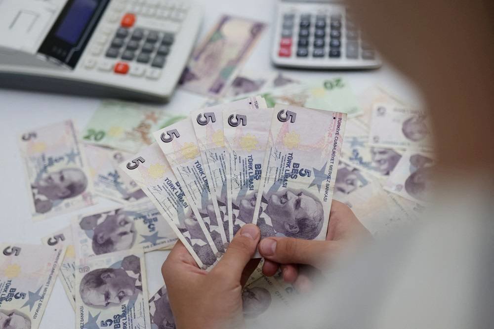 Turkish Lira Weakens to Record Low against Dollar after Erdogan's Strong Election Showing - Vimarsana News