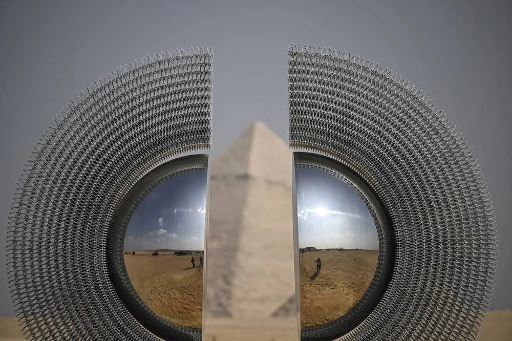 Monumental Art Displayed in Shade of Egypt's Pyramids