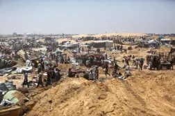 Palestinians inspect the destruction at a makeshift displacement camp following a reported incursion a day earlier by Israeli tanks in the area in Khan Yunis in the southern Gaza strip on July 11, 2025. (Photo by AFP)