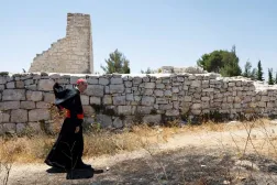 Latin Patriarch in Jerusalem Pierbattista Pizzaballa walks during the visit of the town of Taybeh, a Christian village in the Israeli-Occupied West Bank, following settler attacks, July 14, 2025. (Reuters) 