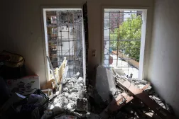 Rubble litters the ground at an apartment that was damaged in an Israeli airstrike at the Chamran residential complex, in Tehran on July 19, 2025. (Photo by AFP)