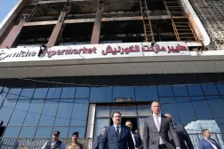 Iraqi Prime Minister Mohammed Shia al-Sudani visits a five-story shopping center after a massive overnight fire killed multiple people, in Al-Kut, Wasit province, Iraq, July 17, 2025. Iraqi Prime Minister Media Office/Handout via REUTERS