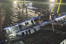 A handout photo made available by the Vietnam News Agency shows a tourist boat being salvaged in Ha Long Bay, Quang Ninh province, Vietnam, 20 July 2025. EPA/VIETNAM NEWS AGENCY  