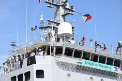 Crew of the Indian Navy survey vessel INS Sandhayak stand on the bridge as it prepares to dock at the international port of Manila on August 1, 2025. (AFP)
