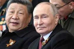 Russian President Vladimir Putin and his Chinese counterpart Xi Jinping attend a military parade on Victory Day, marking the 80th anniversary of the victory over Nazi Germany in World War Two, in Red Square in central Moscow, Russia, May 9, 2025. (Sergei Bobylyov/Host agency RIA Novosti/Handout via Reuters)