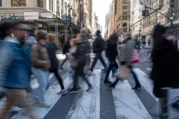 People walk through a busy midtown Manhattan in New York City. (File photo: AFP)