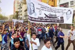 Bangladesh Awami League supporters during a general election campaign procession in Dhaka on Monday. (AFP)
