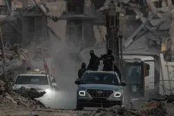 Fighters from the Qassam Brigades, Hamas’s military wing, in Gaza City’s Al Shujaiya district, November 5, 2025 (EPA)