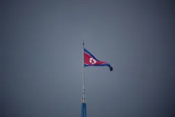 FILE PHOTO: A North Korean flag flutters at the propaganda village of Gijungdong in North Korea, in this picture taken near the truce village of Panmunjom inside the demilitarized zone (DMZ) separating the two Koreas, South Korea, July 19, 2022.    REUTERS/Kim Hong-Ji/Pool/File Photo