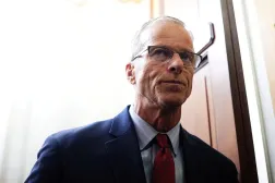 US Senate Majority Leader John Thune (R-SD) looks on outside the Senate Chamber after the vote on the 40th day of the partial government shutdown, in Washington, D.C., US, November 9, 2025. REUTERS/Aaron Schwartz