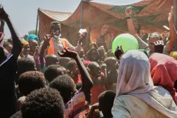 CORRECTS BYLINE.- This photo released by The Norwegian Refugee Council (NRC), shows displaced children from el-Fasher playing at a camp where they sought refuge from fighting between government forces and the RSF, in Tawila, Darfur region, Sudan, Monday, Nov. 3, 2025. (Sarah Vuylsteke/NRC via AP)

